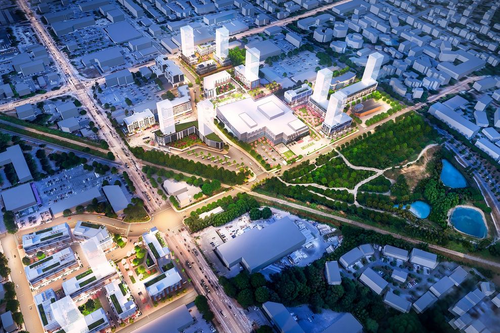 Aerial view of the Newton Centre high-density urban development plan with modern buildings and green spaces